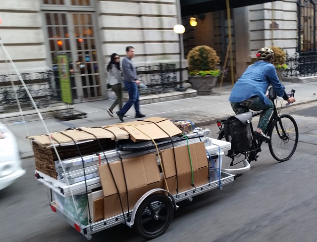 carrying their booth and their wares on their trailer