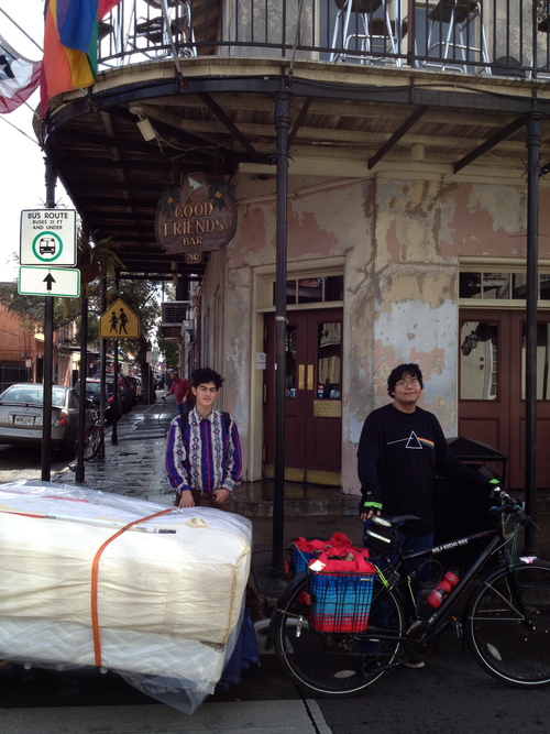 moving a queen-sized mattress in the French Quarter