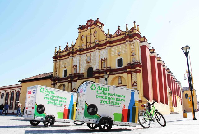 two of their trailers parked by the Cathedral