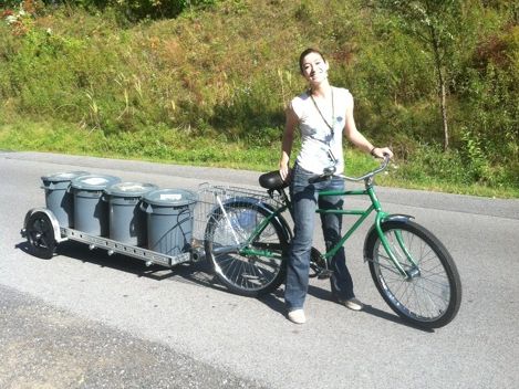 Skidmore College bicycle-powered composting program trailer carrying four containers