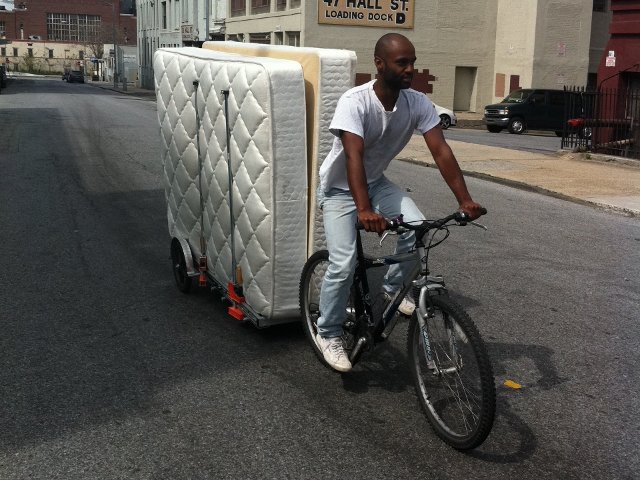 hauling two mattresses on a 64AW bicycle trailer