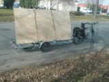 plywood loaded on bike trailer, right side view
