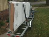 new door carried on rack on bike trailer, right rear view